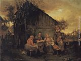 A Family Resting At Sunset